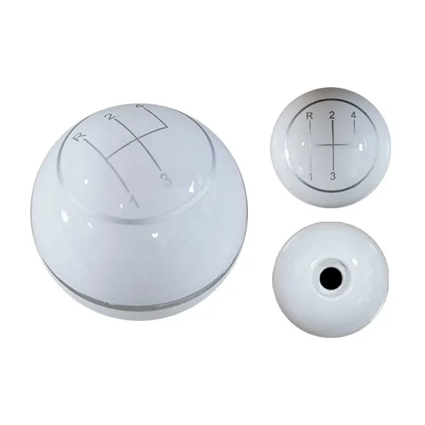 White gear shift knob with chrome ring and engraved gears